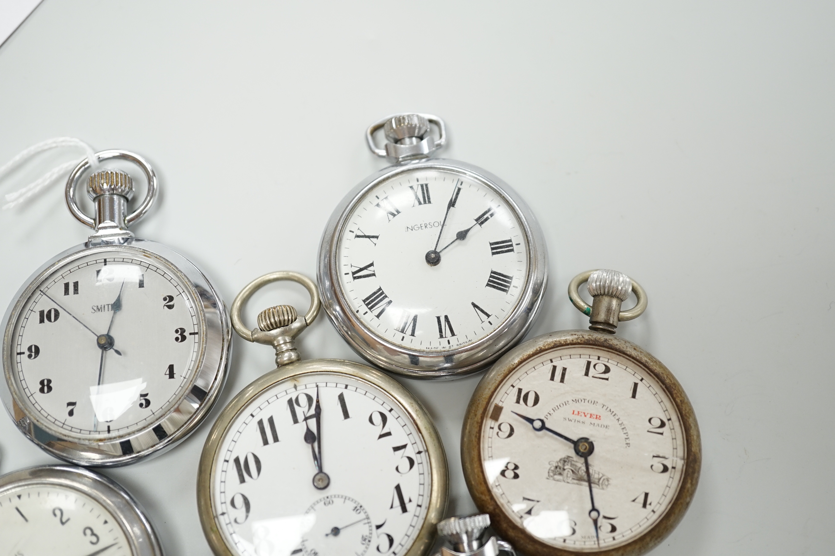 Eight assorted chrome or nickel cased pocket watches, including three Smiths, two Ingersoll, one Record and two others.